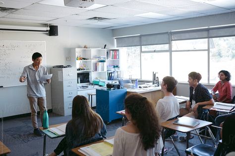 Highschool student giving presentation during class by Rob and Julia Campbell for Stocksy United Giving Presentation Aesthetic, Highschool Student, Highschool Class Aesthetic, Private Highschool Aesthetic, High School Experience Aesthetic, European High School Aesthetic, 1980s College Students, Rich Private School Classroom, Student Presentation