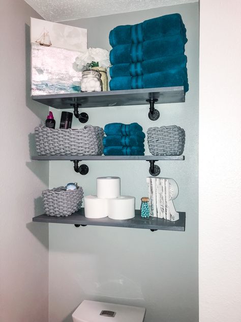 Small Blue Grey Bathroom, Bathroom Decor Blue Walls, Grey And Teal Bathroom Ideas, Grey And Blue Bathroom Ideas Decoration, Black And Blue Bathroom Decor, Bathroom Teal Decor, Gray Bathroom Shelves, Gray Bathroom With Pop Of Color, Black And Blue Bathroom Ideas