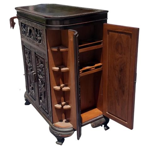 For Sale on 1stDibs - A very sophisticated, heavily hand carved Asian style dry bar , liquor cabinet featuring two central front doors, and 4 side doors, two on each side. Open Dry Bar Cabinet, Side Doors, Dry Bars, Dry Bar, Exterior Decor, Bar Cabinet, Front Doors, Asian Style, Liquor Cabinet