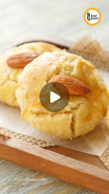 Food Fusion on Instagram: "The best Nan khatai recipe without oven and any fancy tools. All readily available ingredients. Give it a try and Enjoy. #HappyCookingToYou

Ingredients:
Dough:
-Icing sugar 1 Cup
-Ghee 1 Cup
-Maida (All-purpose flour) 1 Cup
-Baisan (Gram flour) ¼ Cup
-Baking powder 2 tsp
-Sooji (Semolina) 2 tbs
-Elaichi powder (Cardamom powder) 1 tsp
-Badam (Almonds) roasted 8-10
Garnishing:
-Ande ki zardi (Egg yolk) whisked as required
-Badam (Almonds) roasted

Directions:
For Dough:
-In bowl,add icing sugar and ghee,whisk well until fluffy & set aside.
-In bowl,place sifter,add all-purpose flour,gram flour,baking powder,semolina and sift together.
-Add cardamom powder and mix well.
-Now add ghee+sugar mixture,mix well and knead until soft dough is formed.
-In dough,add almonds Nan Khatai Recipe, Almonds Roasted, Nan Khatai, Food Fusion, Cooking Toys, Gram Flour, Cardamom Powder, Icing Sugar, Roasted Almonds