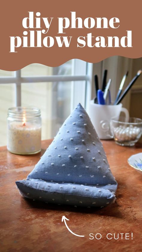 Click the link to check out my quick and easy, step-by-step tutorial on how to make this DIY phone pillow stand! Also, this adorable phone holder makes the perfect birthday and Christmas gift for anyone who has a phone! Try this easy sewing project out for yourself! #diychristmasgifts #homemadechristmasgifts #easysewingprojects #practicalgifts Phone Stands Diy, Phone Pillow Stand, Cell Phone Holder Diy, Phone Holder Diy, Diy Phone Stand, Iphone Holder, Cell Phone Stand, A Cell, Homemade Christmas Gifts