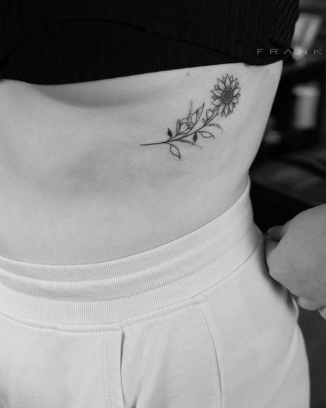 Sunflower tattooed under the breast. Below Breast Tattoo, Under Breast Tattoo Women, Sunflower Tattoo Ribs, Tattoos For Women Underboob, Underboob Flower Tattoo, Sunflower Rib Tattoo, Tattoo Inbetween Breast, Under Breast Tattoos For Women, Tattoo Ideas Underboob