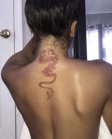 Red inked dragon tattoo on the nape of the neck down the spine | www.otziapp.com Tricep Tattoos, Little Prince Tattoo, Tato Minimal, Tattoo Diy, Band Tattoos, Herz Tattoo, Dragon Tattoo For Women, Snakebites, Ribbon Tattoos