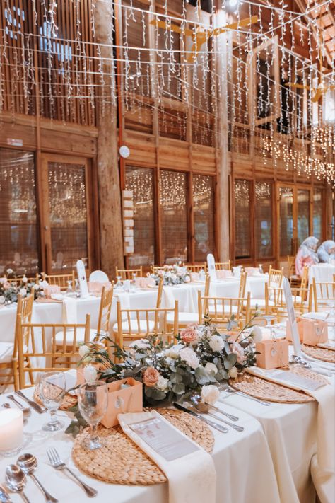 Guest table arrangement with rattan placemats and individual napkins and menu, plus an elegant and simple floral centerpiece. Rattan Placemats Wedding, Simple Floral Centerpieces, Peach Wedding Theme, Rattan Placemats, Wedding Placemats, Guest Table, Rattan Table, Table Arrangement, Floral Centerpiece