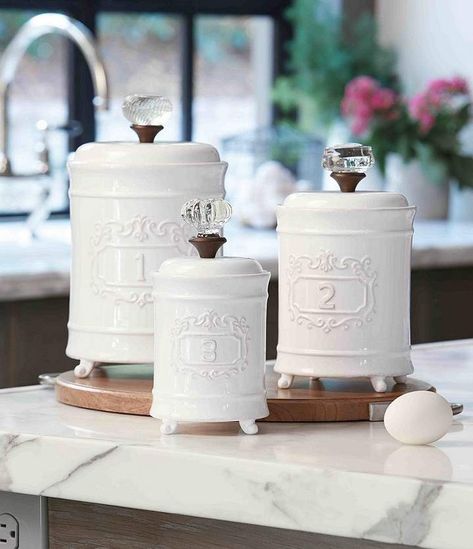 Love these cute canisters with the doornknob tops! Mud Pie 3-Piece Farmhouse Circa Vintage Doorknob Canister Setcanisters feature: lids with vintage-style glass doorknob handles embossed #canister #farmhouse #ad Mud Pie Dishes, Decorative Kitchen Canisters, 3 Piece Kitchen Canister Set, Farmhouse Kitchen Canisters, Mud Pie Kitchen, Ceramic Canister Set, Ceramic Canisters, Kitchen Canister Set, Vintage Canisters