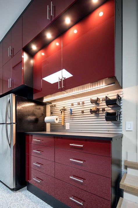 Award-winning Custom Garage by Valet Custom Cabinets & Closets Garage Cabinets Ideas Design, Ducati Garage Ideas, New Age Garage Cabinets, Custom Garage Cabinets Wall, Black And Red Garage, Red Garage Cabinets, Red Garage, Custom Garage Cabinets, Bike Garage