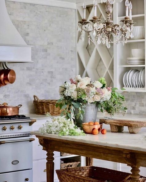 These Dreamy Spaces Showcase Romantic Style’s Versatility Across Settings - Cottage Journal French Country White Kitchen, French Country Decorating Ideas, French Country Style Kitchen, French Kitchens, French Country Farmhouse Decor, French Style Chairs, Country Decorating Ideas, Dreamy Kitchens, Kitchen French