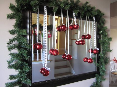 Entry way mirror decorated for #Christmas with hanging ornaments and the trick on how to hang them! | spotofteadesigns.com Christmas Mirror Decorations, Christmas Mirror, Christmas Entryway, Christmas Bathroom Decor, Christmas Bathroom, Dollar Store Christmas, Fun Christmas Decorations, Red Ornaments, Christmas Decorations For The Home