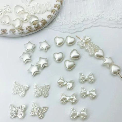 PRICES MAY VARY. ⭐PLENTY BEADS - Totally 200 PCs ABS beads assortments are packed in 4 bags, it is convenient for you to collect and avoid 4 styles mix together(star, heart, butterfly, bowknot shape, each style has 50 pcs), wholesale quantity can meet your various DIY making needs and share with your friends. 🤍EXQUISITE BEADS - The aesthetic beads are made of high quality ABS material, safe, durable and smooth, which can give you nice touch feeling. Each bead has imitation pearl coating on the Aesthetic Beads, Butterfly Beads, Making Bracelets, Jewelry Making Bracelet, Jewelry Making Kit, White Butterfly, How To Make Necklaces, Beads For Jewelry Making, Diy Schmuck