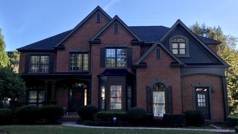 Dark Gray And Red Brick House Exterior, Brick House With Dark Siding, Dark Red Brick House Exterior Colors, Black And Red House Exterior, Red Brick House With Black Accents, Dark Brick Homes Exterior, Maroon Brick House Exterior, House Paint With Red Brick, Red Brick Black Siding