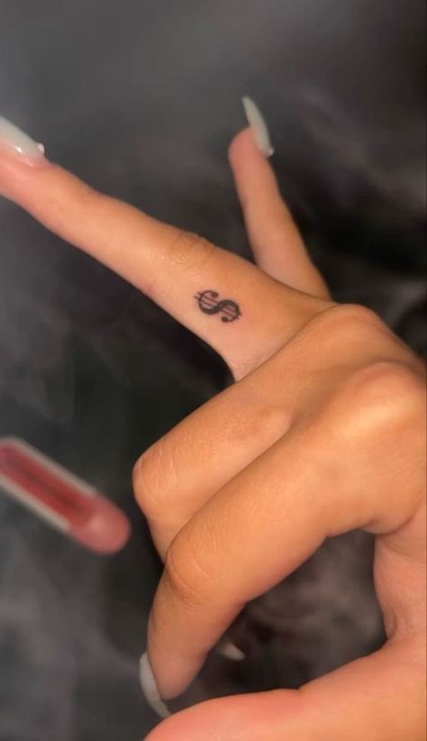 20 Dollar Tattoo Ideas, Dollar Sign Tattoo On Finger, Tattoo Ideas Female Baddie, Dollar Sign Tattoo, Inside Finger Tattoos, Dollar Tattoo, Hand Tatto, Ring Finger Tattoos, Finger Hands