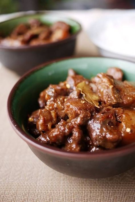 Here I am with another round of adobo. I was actually unenthusiastic about this recipe when my mom first saw it in our national daily. The recipe called for bagoong ( [bɐɡoˈoŋ] bah-go-ong; fermente… Pork Binagoongan, Pork Adobo Recipe, Pork Adobo, Adobo Recipe, Pork Buns, Shrimp Paste, Filipino Dishes, Pork Dishes, Filipino Recipes