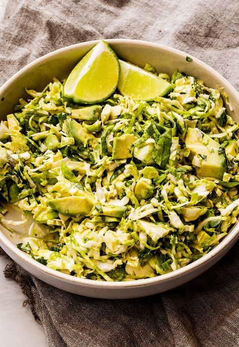 Avocado Brussels Sprouts Slaw Brussel Sprout Slaw For Tacos, Brussel Sprout Tacos, Brussel Slaw, Avocado Coleslaw, Slaw For Tacos, Brussel Sprout Pasta, Brussel Sprout Slaw, Classic Coleslaw Recipe, Carrot Slaw