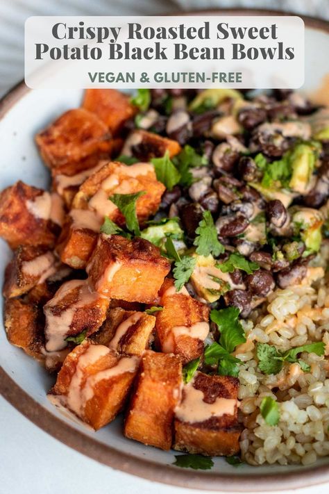 This Crispy Roasted Sweet Potato Black Bean Bowl is an easy dinner ready in 30 minutes. The crispy coated sweet potatoes roast easily in the oven and are served with a chili oil black bean salad. Black Bean Veggie Bowl, Black Bean And Broccoli, Black Beans Dinner Ideas, Sweet Potato Recipes Black Bean, Sweet Potato Black Beans Recipes, Rice Bowls Sweet Potato, Baked Sweet Potato With Black Beans, Black Beans Bowl, Sweet Potato Black Bean Recipes Healthy