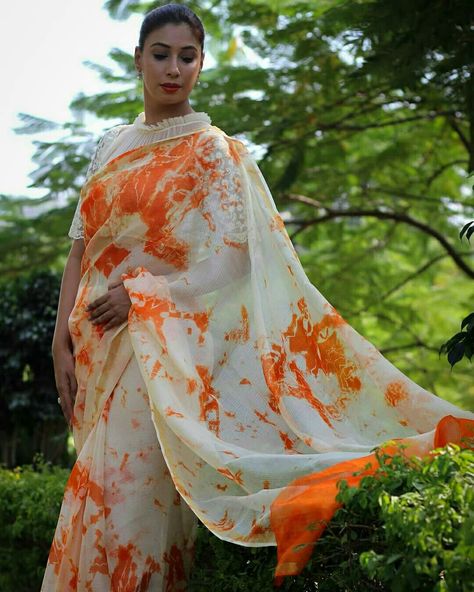 Orange marble slice tye and dye saree! #saree #sari #sareenotsorry #sarilove #sareelove #orange #white #orangeandwhite #orangewhitesaree #orangeandwhitesaree #marble #marblecake #marbleprints #frills #ruff #frilly #frillyblouse #lace #lacelove #laceblouse #whiteblouse #whitelace #whitelaceblouse #tyeanddye #tieanddie Tie Dye Saree, Tie And Dye Saree, Orange Marble, Tye And Dye, Orange Tie Dye, Frilly Blouse, White Saree, White Lace Blouse, Orange Tie