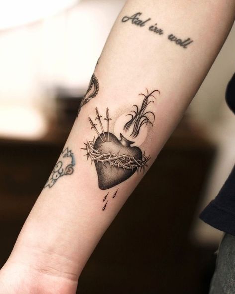 Small Spiritual Tattoos, Purple Heart Tattoos, Heart Tattoo Ideas, Heart Tattoo Wrist, Tato Minimal, Sacred Heart Tattoos, Mary Tattoo, Christ Tattoo, Greek Tattoos