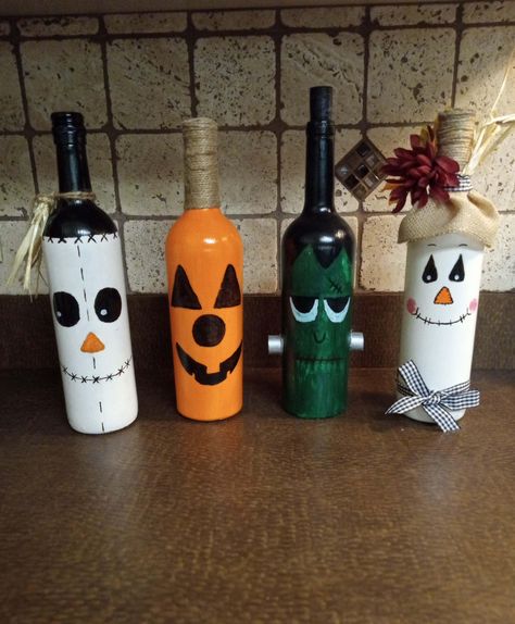 Seasonal Wine Bottle Decor, Great center pieces, for every holiday table or mantel. Made to order Frankenstein Wine Bottle, Fall Wine Bottles Diy, Christmas Crafts With Wine Bottles, Things To Do With Wine Bottles, Wine Bottles Crafts, Liquor Bottle Decor, Recycled Wine Bottle Art, Holiday Wine Bottle Crafts, Halloween Wine Bottle Decorations