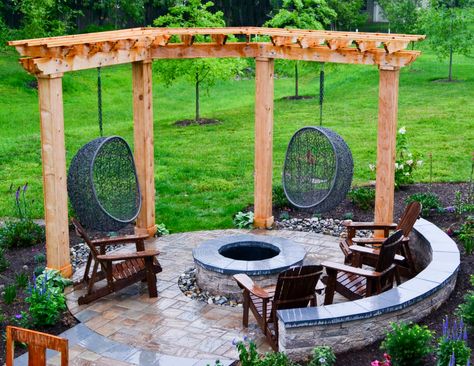 Playset And Trampoline Landscaping, Funky Outdoor Spaces, Swings Around Fire Pit, Pergola Fire Pit Ideas, Pergola Fire Pit, Egg Chairs, Pavers Backyard, Outdoor Fire Pit Designs, Fire Pit Landscaping