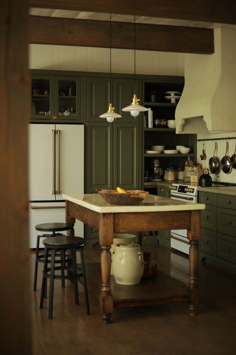 Green kitchen cabinets Oak Kitchen Green Walls, Green Brown Kitchen Cabinets, Green Kitchen Wood Island, Green Cabinets Dark Floor, Green Cottage Kitchen Cabinets, Green Kitchen Wood Cabinets, Dark Green Kitchen Cabinets, Moody Cottage, Paint Your Cabinets