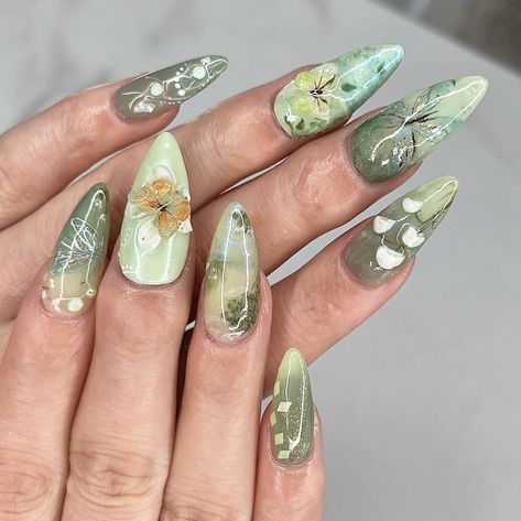 🧚🏻‍♂️ green fairy meadow 🍃 I can’t help but say I slayed this set 💯💚 my top 3 fairycores for sure 🤭 My custom design on a Medium Stiletto @apresnailofficial Gel-X, client asked for fairycore and left everything up to me ✨ #nailinspo #naildesign #vancouvernails #fairycorenails #gardennails #naturenails #nails2inspire #trendynails #gelxinspo #pinterestnails #summernails #springnails #3dflowernails #3dnailart Fairy Nails Acrylic, Green Fairy Nails, Fairycore Nails, Prom Things, Character Closet, Medium Stiletto, 3d Flower Nails, My Top 3, Green Fairy