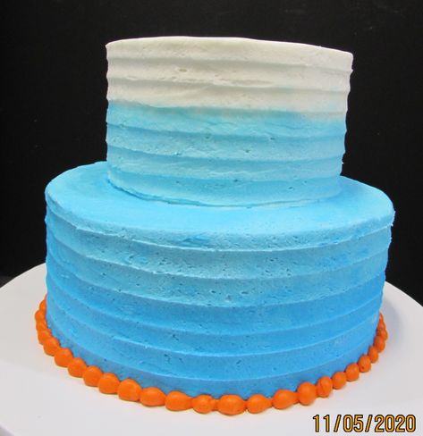 Blue And Orange Cake Birthday, Blue Orange Birthday Theme, Yellow And Blue Cake Designs Birthday, Two Tier Blippi Cake, Blue And Orange Cake, Blue Buttercream Cake, Blue And White Ombre Cake, Blippi Party, Orange Birthday Cake