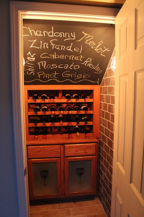 Wine closet. A great way to utilize the under the stairs space! The wooden panels were taken out of the vanity and replaced by glass which we frosted after creating the wine glass image. Wall and floor tiles from Menards and chalkboard paint. Wine Cellar Closet, Under Stairs Wine Cellar, Under Stairs Pantry, Closet Under Stairs, Wine Closet, Image Wall, Stairs Storage, Home Wine Cellars, Kitchen Design With Island