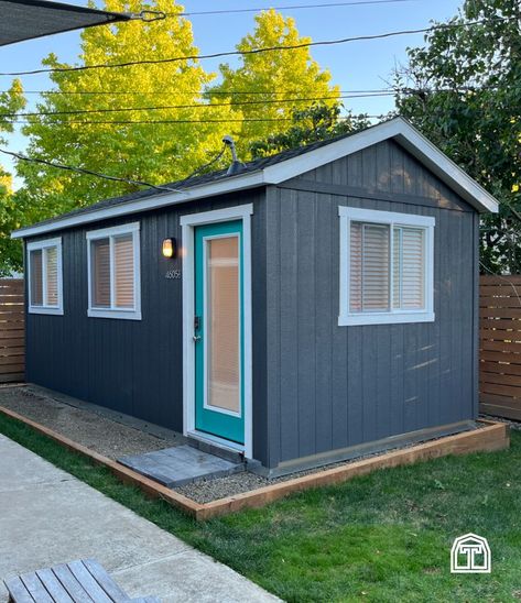 This home office shed is the ultimate home workspace inspiration. With a step by step video guide to all the DIY interior finishes, Dillon's DIY office is truly one amazing home office shed. He customized the shed design with extra windows and a teal front door to add extra style. Take a tour of the shed interior and see how he designed a home office space that has more than enough room to work from home. This DIY home office is a perfect shed design idea and for a future shed office. Teal Front Door, Amazing Home Office, Home Office Shed, He Shed, Teal Front Doors, Shed Studio, Diy Home Office, Big Sheds, Office Shed