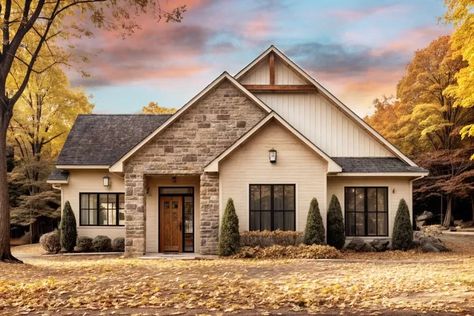 This Transitional Country Cottage presents a blend of siding materials with a pop of stone to complete the look. The heart of the home flows into the adjacent dining and living areas, where a fireplace surrounded by builtins serves as the focal point. Guests will naturally convene at the elongated prep island with seating for five, or slip through the sliding doors and enjoy the back patio. Pocket doors in the master bedroom part to reveal a pass-thru closet that leads to the 5-fixture ensuite. Down the hall, a second bedroom and home office offer forward-facing views. The lower level doubles the square footage and delivers play, media, and exercise rooms, along with two additional bedrooms and a 3/4 bath. Related Plan : Get a version with a garage with house plan 22665DR (2758 sq. ft.). Renovation Plan, Lake Houses Exterior, Exterior House Color, Houses Ideas, Casas Coloniales, Cottage Plan, Island With Seating, Siding Materials, Farmhouse House