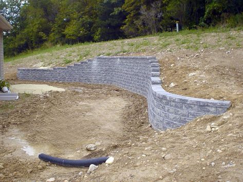 tapered wall into hill Tapered Retaining Wall, Sloped Backyard Landscaping, Landscaping On A Hill, Sloped Backyard, Spring Furniture, Landscaping Images, Sloped Garden, Cold Spring, Backyard Deck