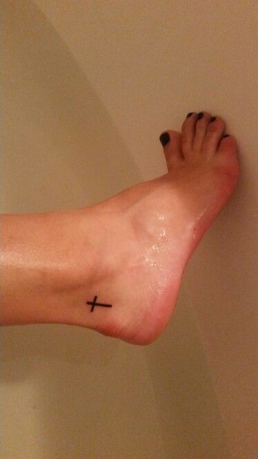 My very own and first tattoo... Represents and symbolizes my Faith and the Bible verse "Walk by faith, not by sight"... #Tattoo #cross #foot Cross Tattoo Placement, Faith Foot Tattoos, Tiny Cross Tattoo, Peter Pan Tattoo, Woman Tattoos, Simple Cross Tattoo, Tattoo Cross, Bible Verse Tattoos, Verse Tattoos