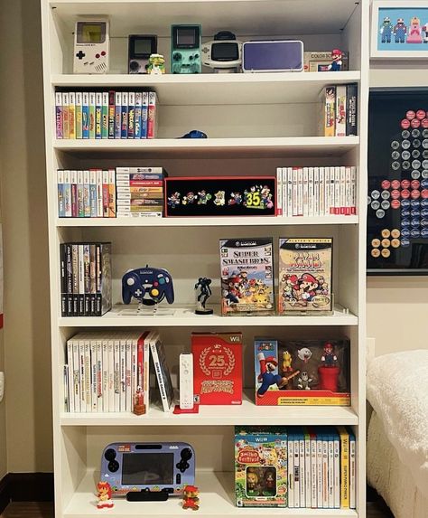 Nintendo Gaming Room, Game Shelf Organization, Gaming Bookshelf, Video Game Console Shelf, Game Console Shelf, Gaming Shelf, Video Game Shelf, Video Game Organization, Game Shelf