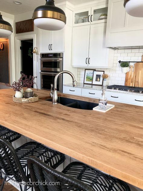 How our wood counters have held up years later | Thrifty Decor Chick | Thrifty DIY, Decor and Organizing Butcher Block Island With Sink, Walnut Island Countertop, Diy Butcher Block Island, Diy Wood Counters, Wood Island Countertop, Butcher Block Counters, Wood Counters, Diy Butcher Block, Wood Countertops Kitchen