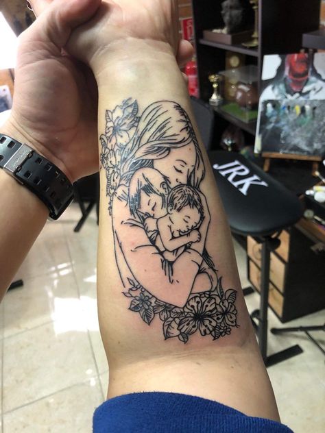 Finally my unique, personally designed tattoo is done. I love it, my daughter and my son is on my arm and in my heart, forever. Mother Protector Tattoo, Mother And Son Tattoo Ideas Being A Mom, Mom Two Kids Tattoo, Mom Son Daughter Tattoo, Mother And Two Sons Tattoo, Motherhood Tattoos Unique 3 Kids, Daughter And Son Tattoo For Mom, Daughter And Son Tattoo, Mother Kids Tattoo Ideas