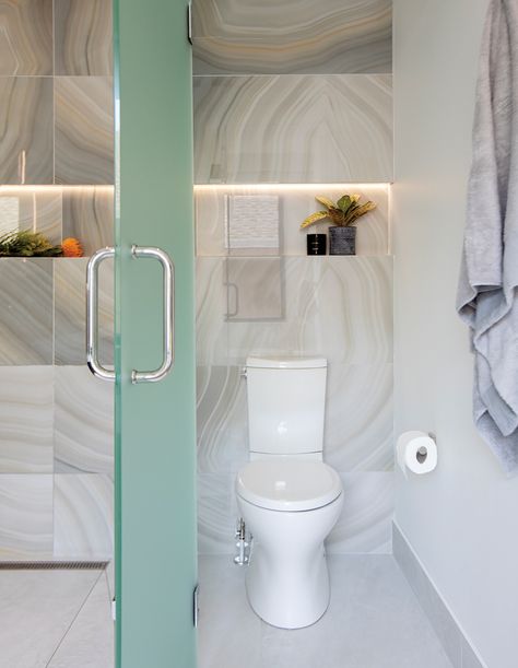 Step Inside A Petite Bathroom Inspired By The Pacific Northwest - House & Home Office Bathrooms, Frosted Glass Wall, Spa Space, Shower Alcove, Polished Nickel Faucet, Backsplash Patterns, Wall Niche, Sleek Storage, Water Closet