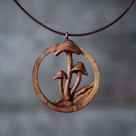 An antidote to the complexity of my previous pendant carving. This little Oak Mushroom pendant is hand carved in wood from a 400 year old English Oak tree and measures just 35mm / 1.25in in diameter. To add a little challenge I also carved the gills... Sculpture Dremel, Wooden Jewelery, Dremel Carving, Wood Jewelery, Mushroom Pendant, Dremel Wood Carving, Wood Carving Designs, Wood Carving Patterns, Wooden Necklace