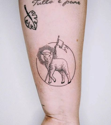 What Does a Lamb Tattoo Mean? Symbolism, Art Ideas - Parade Paschal Lamb Tattoo, Worthy Is The Lamb Tattoo, Lamb Face Tattoo, Lamb Head Tattoo, American Traditional Lamb Tattoo, Christian Lamb Tattoo, Fear The Lamb Tattoo, Monstrance Tattoo, Communion Tattoo