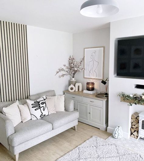 23 Scandinavian-Style Living Rooms Ideas We Want to Copy Light Ideas Living Room, White Scandinavian Living Room, Minimalist Living Rooms, Ceiling Lighting Ideas, London Living Room, Low Ceiling Lighting, Cozy Minimalist, Swedish Furniture, White Couches