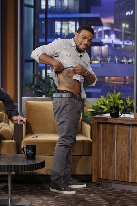 Olympic Gold Medal Wrestler Jordan Burroughs shows off his 'Momma's Boy' tattoo during his appearance on the Tonight Show with Jay Leno August 15th, 2012. Jordan Burroughs, Olympic Wrestling, Olympic Gold Medals, Boy Tattoos, Tonight Show, Gold Medal, Wrestling, Tv Shows, Celebrities