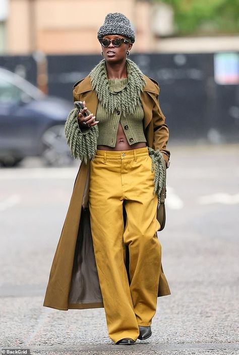 The 37-year-old donned a flamboyant ensemble when she met a friend for a coffee. The actress wore a pair of mustard coloured trousers with a relaxed straight leg fit and a dark sage green knitted cardigan, engulfed in extravagant fringe around the neck and cuffs Street Style Trousers, Mustard Green Outfit, Fringe Boots Outfit Fall, How To Style Green Sweater, Cool Casual Outfits Women, Fringe Cardigan Outfit, Dark Green Trousers Outfit, 2024 Fall Outfits, Cool Fashion Outfits