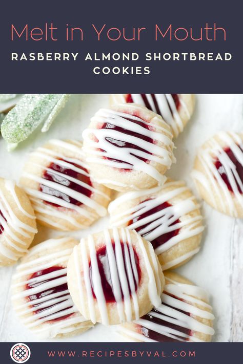 These homemade Raspberry Almond Shortbread Cookies are bound to be a hit in your home. They are sweet, light, and melt in your mouth! Head to my blog for the full recipe! | shortbread cookie recipe | shortbread cookie recipe easy | shortbread cookies buttery | shortbread cookies with jam | shortbread cookies christmas | #familybaking #familyrecipes #holidaybaking #cookierecipe #shortbreadcookies Raspberry Shortbread, Raspberry Swirl Shortbread, Raspberry Shortbread Cookies Recipes, Raspberry Swirl Shortbread Cookies, Raspberry Almond Shortbread Thumbprints, Raspberry Shortbread Cookies With White Chocolate Drizzle, Easy Shortbread Cookie Recipe, Shortbread Cookies Christmas, Shortbread Cookies Easy