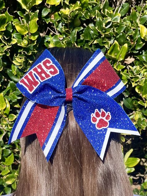 Elevate your cheer game with this dazzling 7" x 7" glitter cheer bow!  🎀Crafted with 3" wide grosgrain and fully covered in glitter heat transfer vinyl, these bows are not only stylish but also customizable with your team logos. 🎀For complex logos, please send them beforehand for confirmation. Note that colors may vary slightly in person, so if you have concerns, I can provide color swatches or pictures taken in natural lighting.  🎀The bows are securely attached to Goody brand hair ties, ensu Cheer Games, Character Hair Bows, Competition Cheer, Bow Making Tutorials, Character Hair, Glitter Cheer Bow, School Breakfast, Bow Ideas, Glitter Heat Transfer Vinyl