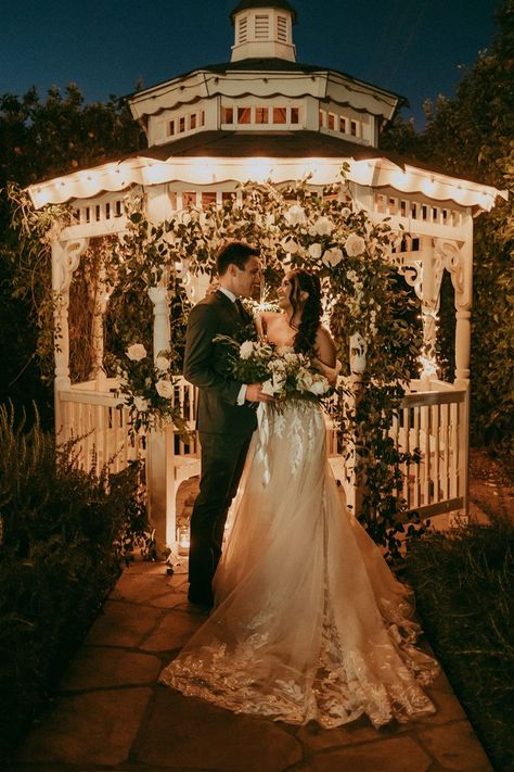 Wedding gazebo styled with flowers and bride and groom. See more from Sosco Flute - wedding musicians on Wedding Vault. Wedding Photos Gazebo, Gazebo Wedding Photos, Gazebo Wedding Ideas, Woodstock Wedding, Wedding Gazebo, Wedding Musicians, Gazebo Ideas, Power Of Music, Music Making