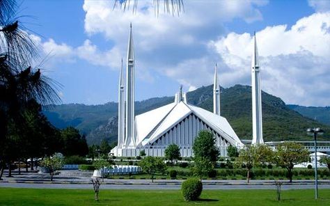 Faisal Mosque, Islamabad is the World's 5th Largest Mosque & Asia's 1st Highest located on the foothills of Margalla Hills in the World 2nd Beautiful City "Islamabad". Faisal Mosque is a major tourist attraction in Pakistan, the mosque is a contemporary and influential piece of Islamic architecture. Every year millions of people visit this beautiful mosque around the world. Faisal Masjid, Faisal Mosque, Desert Tent, Pakistan Culture, Bahria Town Karachi, Pakistan Travel, Dream Mansion, Family Tour, Islamabad Pakistan