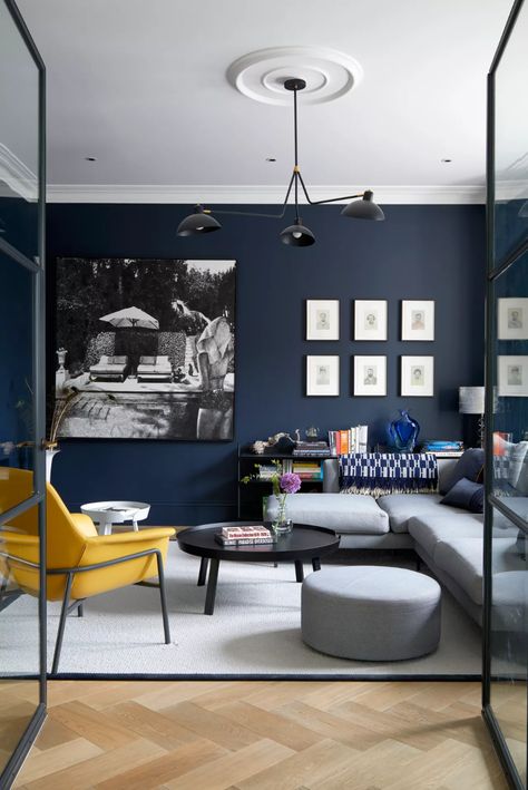 Colors that go with navy blue – the best shades to combine with this moody hue | Livingetc Decor Living Room Table, Moody Home, Moody Home Decor, Navy Living, Navy Living Rooms, Navy Blue Living Room, Blue Lounge, Navy Walls, Navy Blue Walls