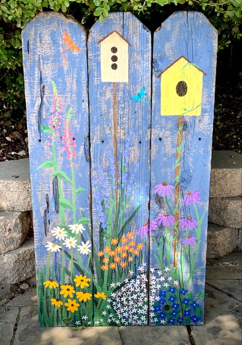 Acrylic painted garden on reclaimed fence boards, wood, flowers, birdhouse Left Over Fence Wood, Wood Pallet Art Paint, Painting Murals On Fences, Painted Pallets For Outside Garden, Painted Garden Gate, Painted Fence Panels, Privacy Fence Painting Ideas, Fence Art Painting, Painted Fences Ideas Backyards