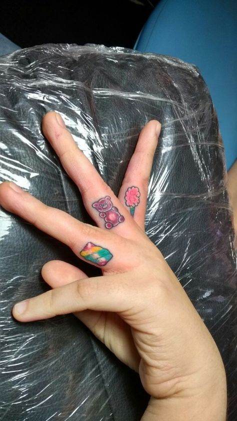 Kawaii tattoo, minimalist tattoo  sweet tattoo , gummy bear tattoo, cotton candy tattoo, marshmallow tattoo, colorful tattoo Minimalist Candy Tattoo, Gummy Bear Tattoo Small, Cotton Candy Tattoo, Marshmallow Tattoo, Gummy Bear Tattoo, Coquette Tattoo, Sarah Tattoo, Tattoo Colorful, Candy Tattoo