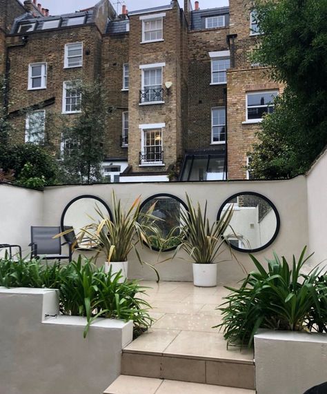 Gotta Have It: Garden Mirrors | Muddy Stilettos Kent Patio Mirrors Outdoor Living, Mirrors Outside Gardens, Diy Garden Mirror Ideas, Mirror Garden Ideas, Mirrors In The Garden Ideas, Mirror In Garden, Garden Mirrors Ideas Outdoors, Mirrors In Gardens, Outdoor Mirrors Garden