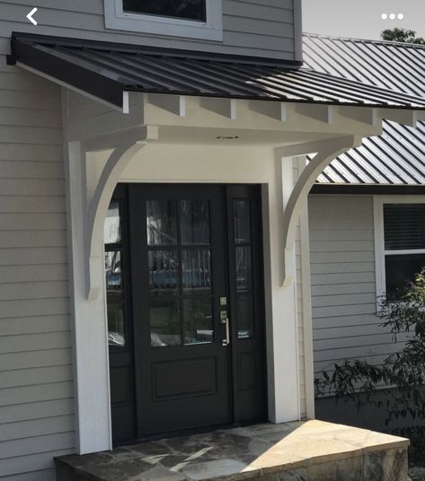 Awning Across Front Of House, Front Door Overhang Brick House, Overhang For Garage Door, Cottage Facade Ideas, Front Door Peaked Roof, House Awnings Front Door, Arbor Over Front Door Entrance, Farmhouse Portico Entry, Front Door Roof Overhang Entrance