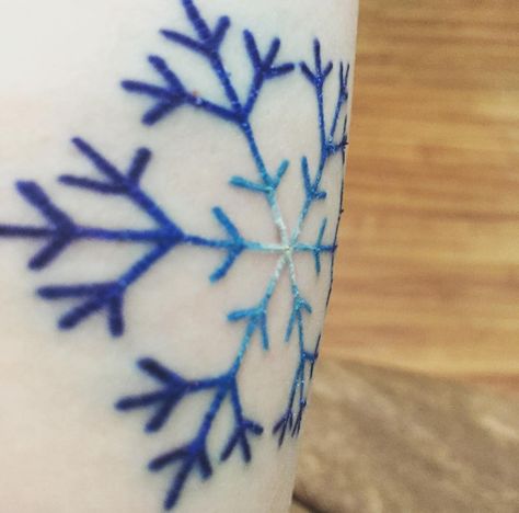 21 Gorgeous snowflake tattoos to inspire your ink: Blue fade White Snowflake Tattoo, Tattoo On Face, Snowflake Tattoos, Snowflake Tattoo, Winter Tattoo, Vegas Tattoo, Snow Flake Tattoo, Snowflake Images, Face Tattoos