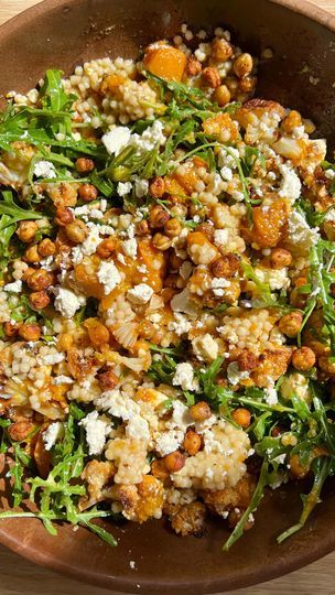 845 reactions · 26 shares | crispy chickpea, roasted cauliflower and pumpkin salad ✨  My favourite way to eat roasted veggies is in salads and this one is absolutely loaded with all the goods!! It has so many delicious flavours and textures, and makes for a fabulous light meal or side dish 🤤  INGREDIENTS  Rocket  Feta   Roasted cauliflower and pumpkin: 1/4 of a small pumpkin  1/2 of a small cauliflower  Drizzle of olive oil Salt Garlic powder  Onion powder  Paprika   — Bake at 200°c for 35-40 mins or until golden brown  Crispy chickpeas: 1 can of chickpeas (rinsed/drained)  Drizzle of olive oil Salt Garlic powder  Onion powder  Paprika   — Bake at 200°c for 25-30 minutes or until crispy.   Cous cous  1 cup pearl couscous  1 cup vegetable stock  — Cook as per directions   Dressing: 3tbsp o Crispy Chickpea Roasted Cauliflower And Pumpkin Salad, Chickpea Roasted, Crispy Chickpea, Mediterranean Diet Recipes Dinners, Pumpkin Salad, Pearl Couscous, Soul Kitchen, Crispy Chickpeas, Cauliflower Salad